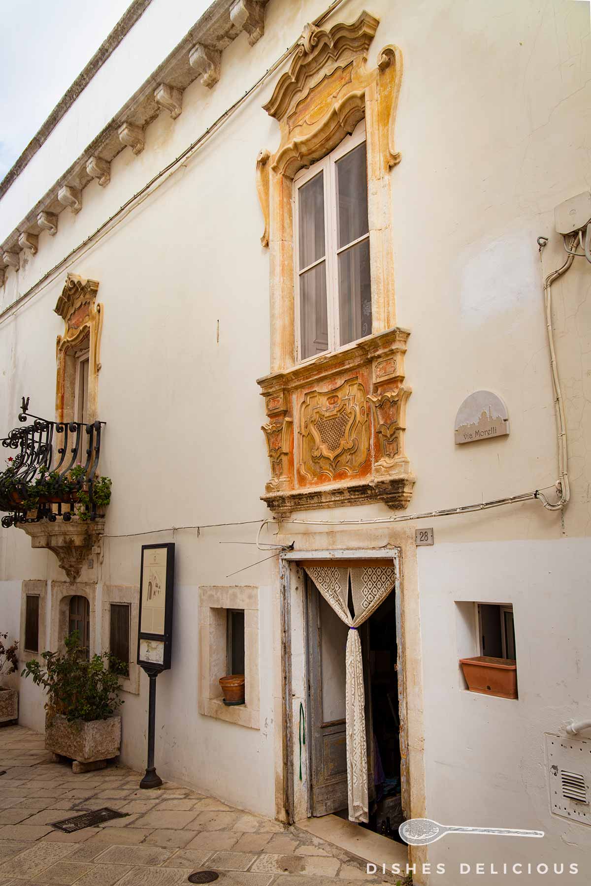 Verziertes Fenster des Palazzo Morelli.