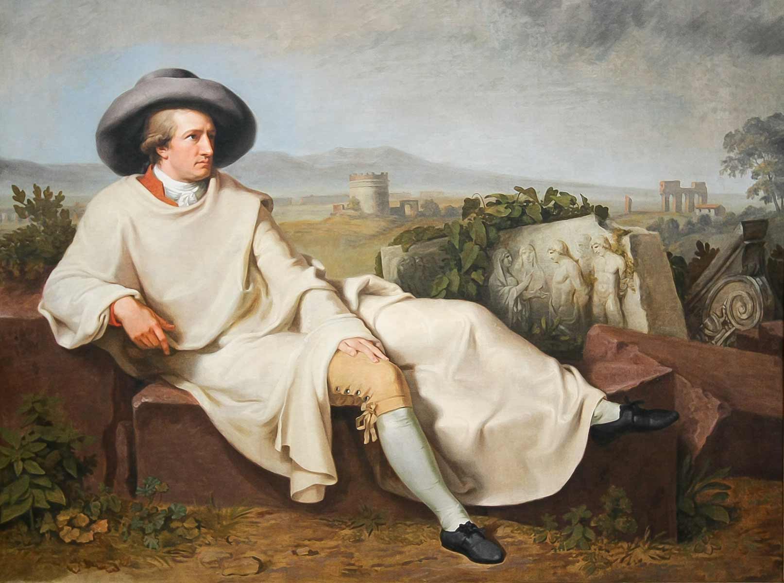 Gemälde: Goethe posiert auf antiken Steinen in der römischen Landschaft.